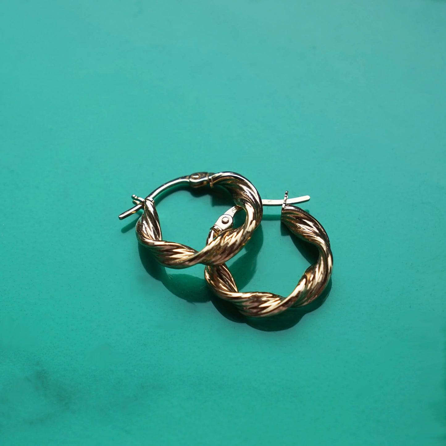 9K GOLD SMALL TWIST HOOP EARRINGS