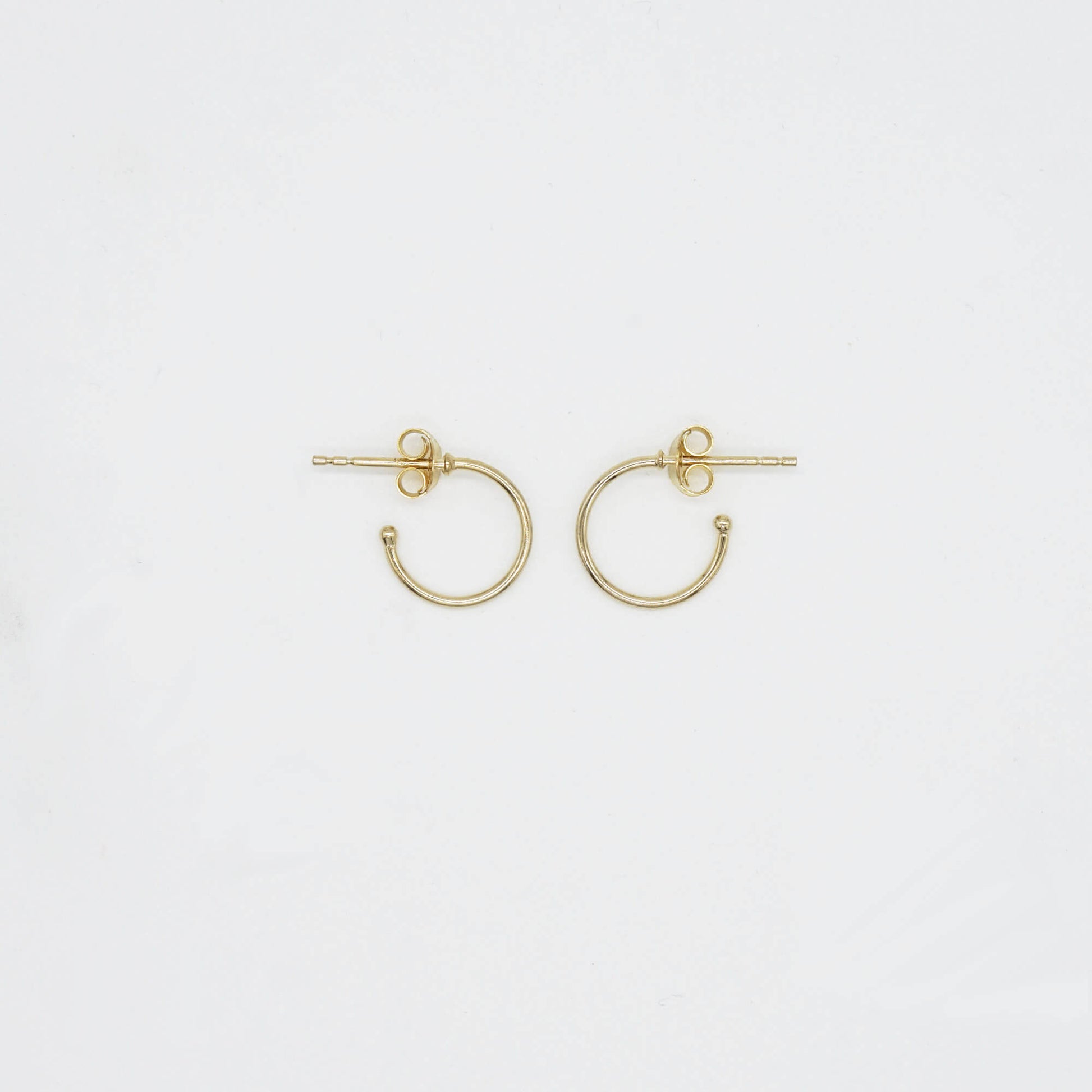 PAIR OF FINE OPEN HOOP EARRINGS WITH POST BACK IN REAL GOLD PLATE OVER STERLING SILVER.