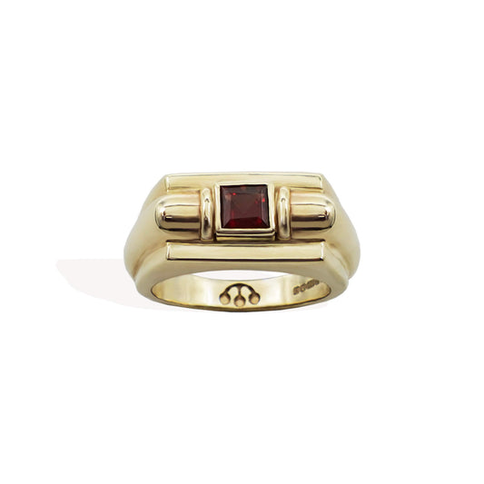 Solid 9K gold rectangle signet ring, set with a princess cut red garnet , hallmarked & with pawnshop balls logo on inner band.