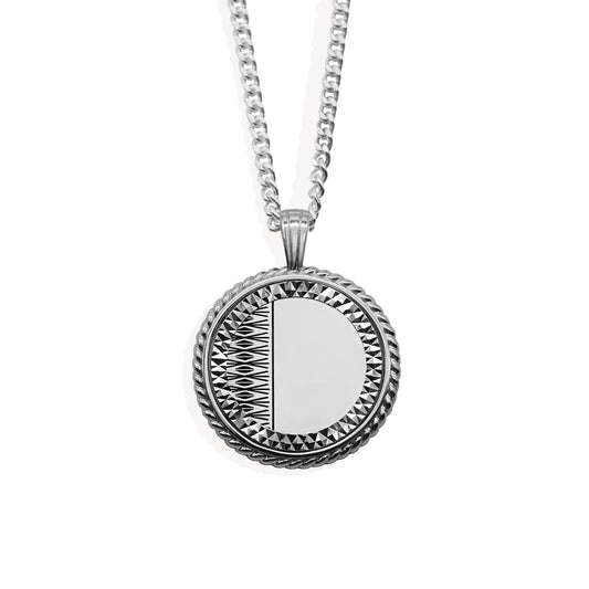sterling silver pendant set in half son mount with diamond engraving on a curb chain.