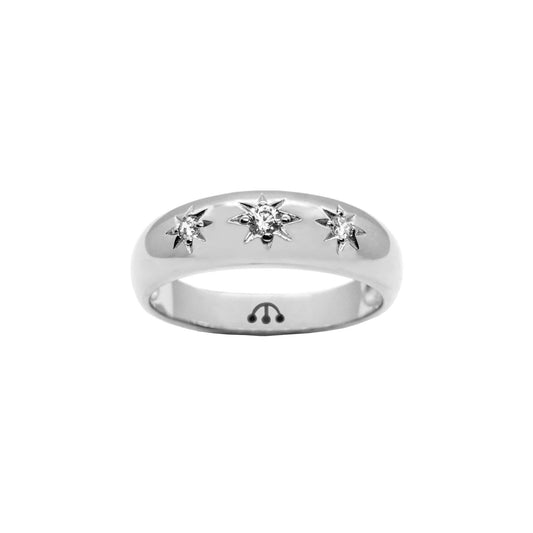 Pawnshop Sterling Silver Starburst Ring, with three cubic zirconia stones on a white background. Pawnshop black three ball logo can be seen on the inner band.