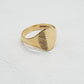 side profile oval signet ring with etch pattern detail to side of face, hallmarks on inner band.